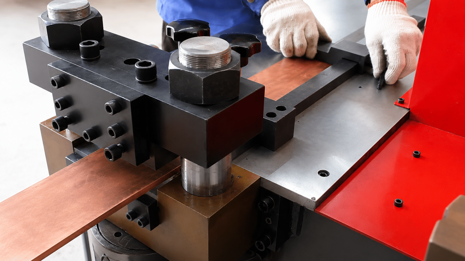 Hydraulic busbar processing machine cutting copper busbar in transformer production