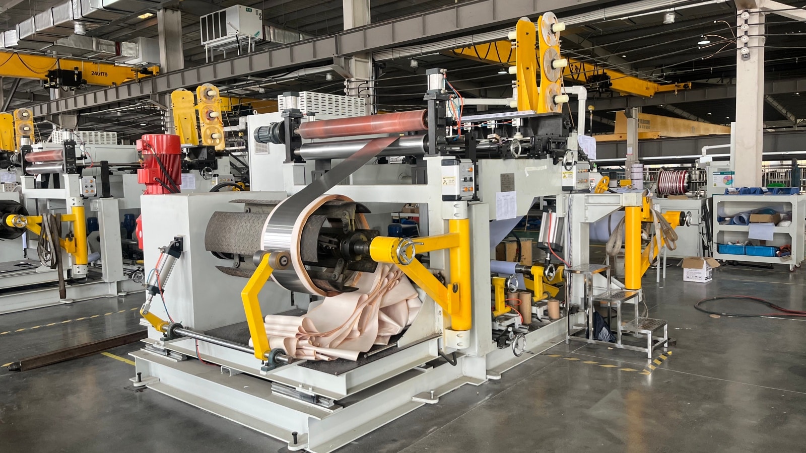 Precision foil winding equipment used for efficient production of LV transformer coils