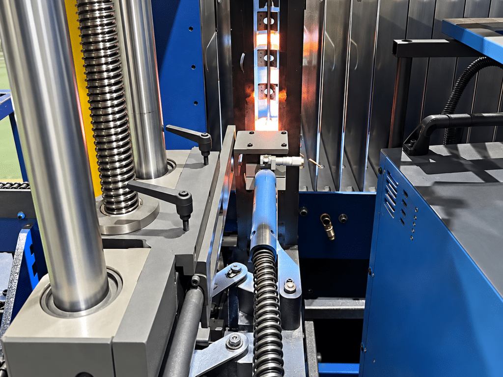 The torch and wire-feeding mechanism travelling automatically along the corrugation crest