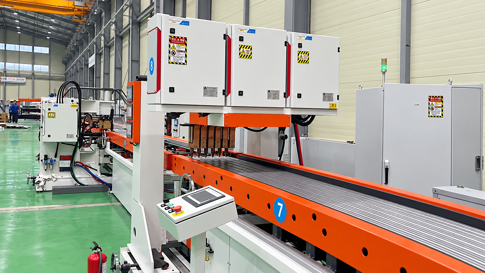 Gantry multi-spot welding station processing a radiator fin on the production line