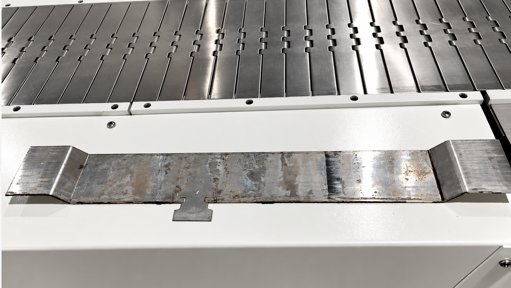 Folded copper busbar with two bends formed on the CNC busbar sawing and folding machine