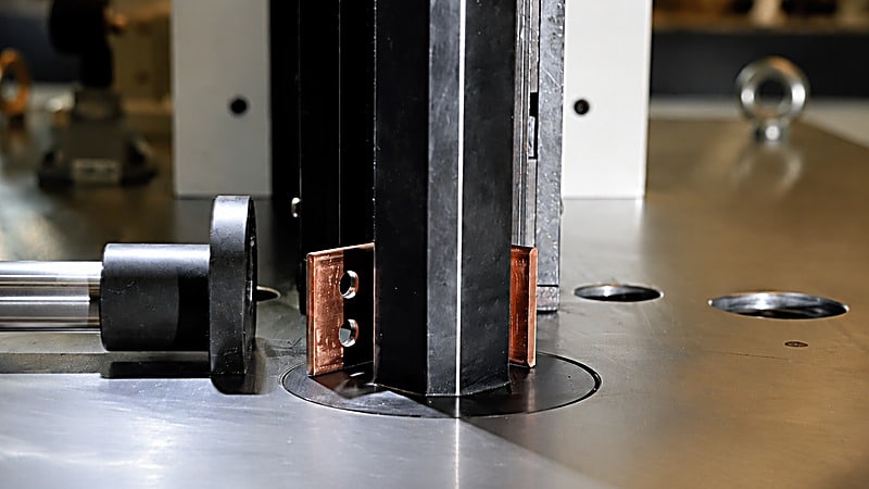 Close-up of the closed bending station on the servo CNC busbar bending machine